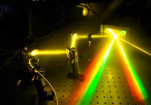 image credit: Antti Aalto; <a href="http://www.tut.fi/en/about-tut/departments/physics/research/optics/research-projects/applied-optics/index.htm" target="_blank">image source</a>; <a href="http://www.compadre.org/informal/images/features/supercontinuum-laser-large.jpg" target="_blank">larger image</a>